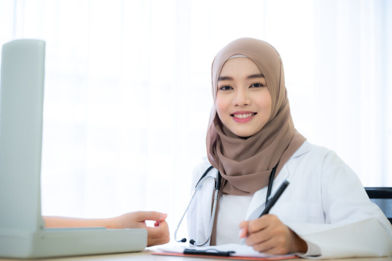 The portrait of beautiful Muslim woman doctor who wear hijab works at the hospital to take care